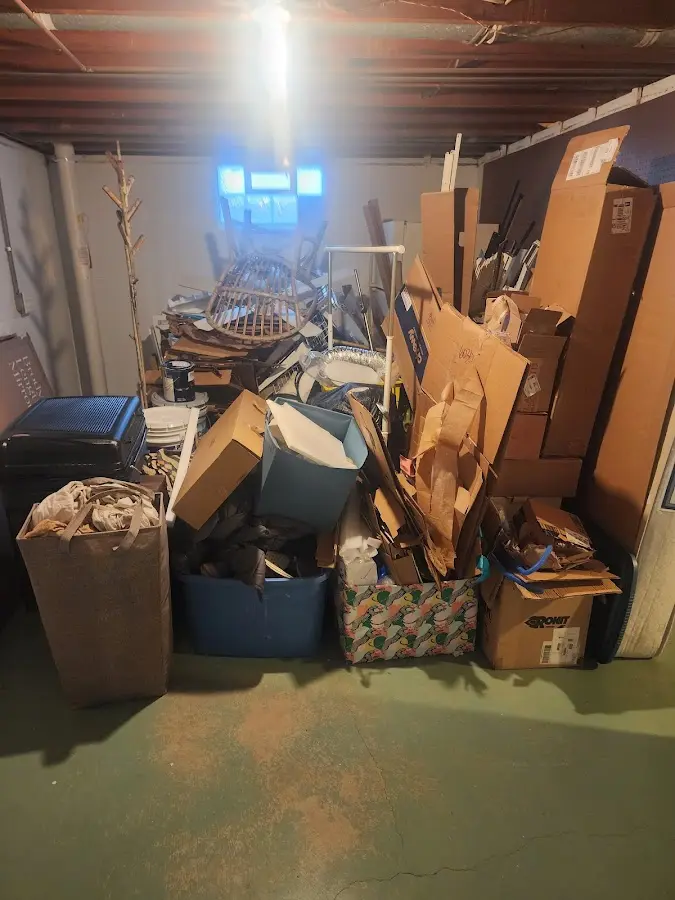 Roll-off dumpster container at job site for Concrete Dumpster Rental in Spring Lake Heights